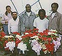 Inmates from the horticulture program at Craven Correctional Institution and instructor Carolyn Schoch
