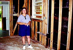 Kay Manning in her destroyed kitchen