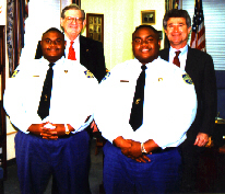 Franklin Freeman and Mack Jarvis with twins Elton and Shelton Rogers, correctional officers at Franklin C.C.
