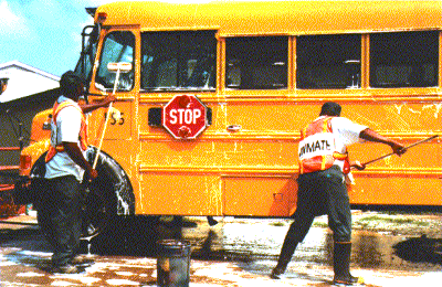 Community Work Program Inmates Scrub Buses