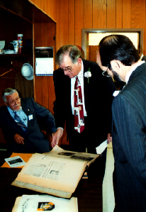 Secretary Jarvis and Superintendent Morrow take a look at Dr. White's collection of articles on Western