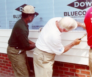 Governor Hunt Joins Inmates in Floyd Recovery Construction Project