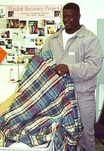 Inmate displays finished blanket