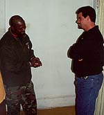 PPO Robert Martin talks with one of his probationers during a curfew check