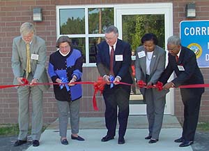 Ribbon cutting to open new license tag and duplicating plants