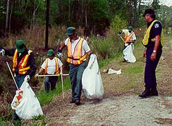 Inmates pick up trash