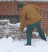 Inmate shovels snow