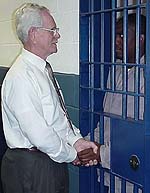 Chaplain visits inmate in cell