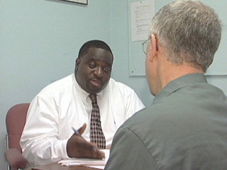 probation officer meets with client